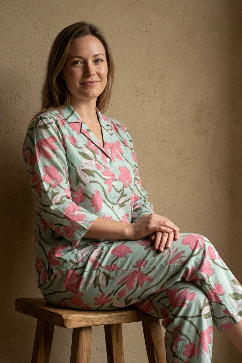 Women wearing Paisley Affair Pajama set and sitting calmly on a bench