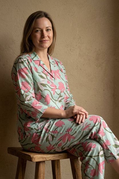 Women wearing Paisley Affair Pajama set and sitting calmly on a bench